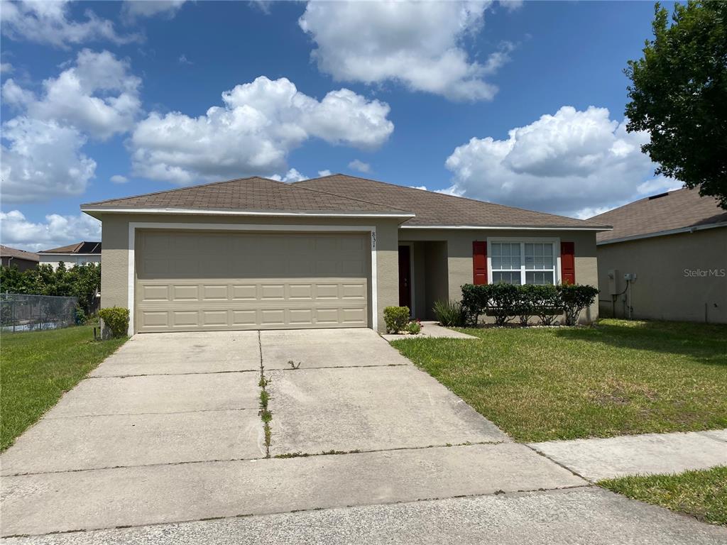 front view of house with a yard