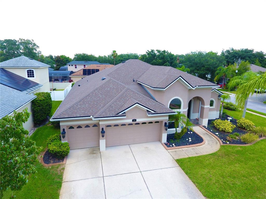 a aerial view of a house with garden