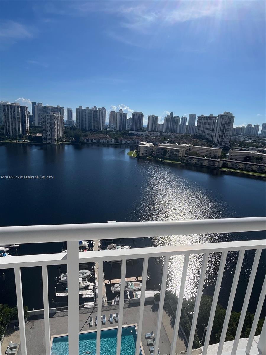 a view of a lake with a city