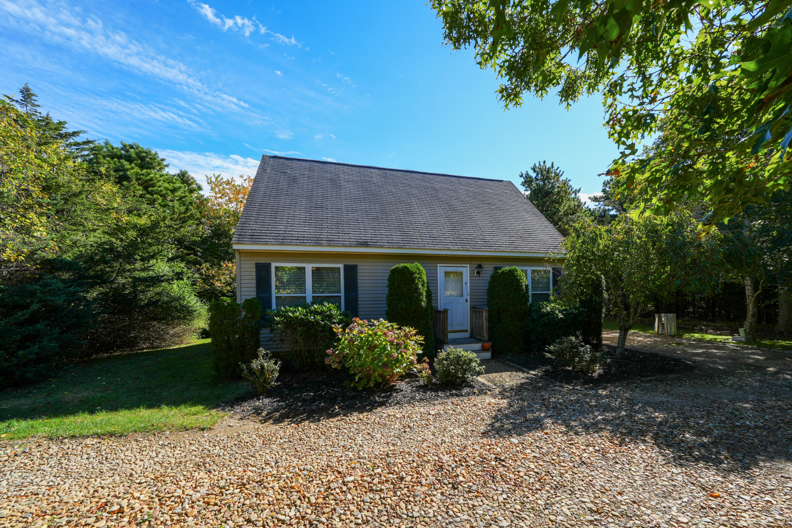 a view of a house with a garden