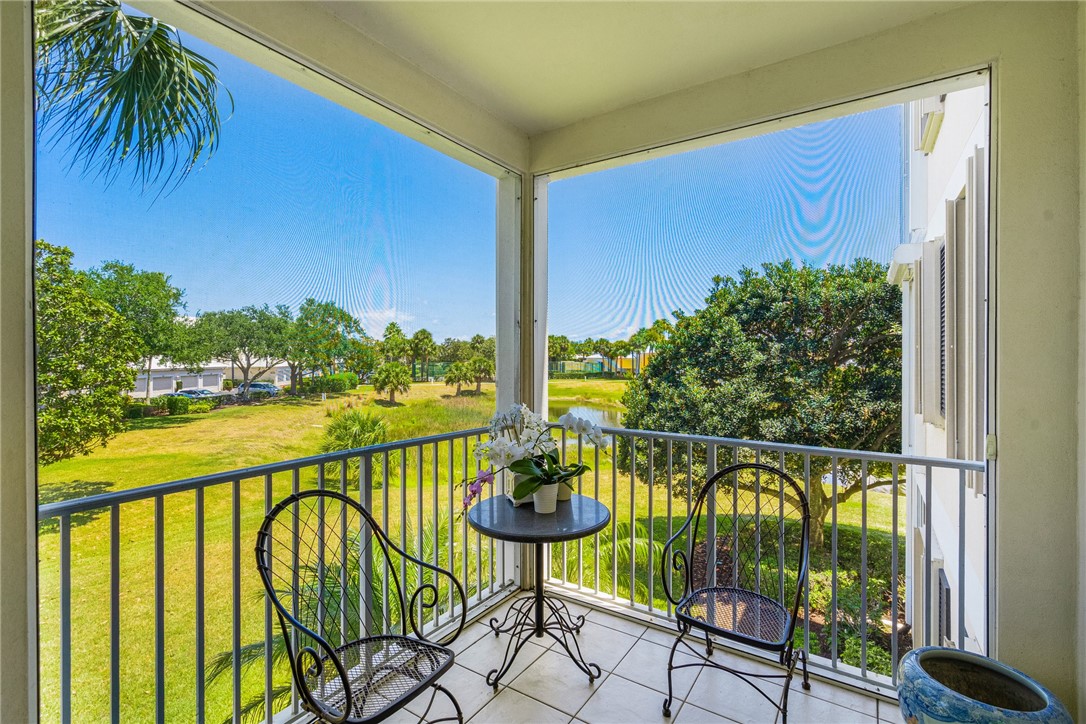 a view of balcony with furniture