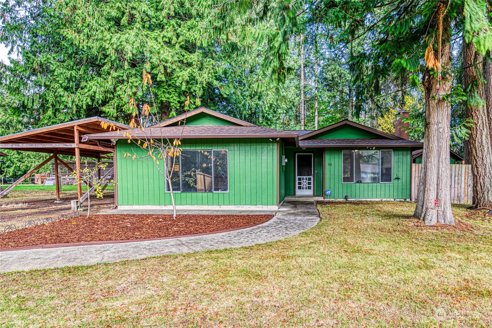 a house with yard in front of it