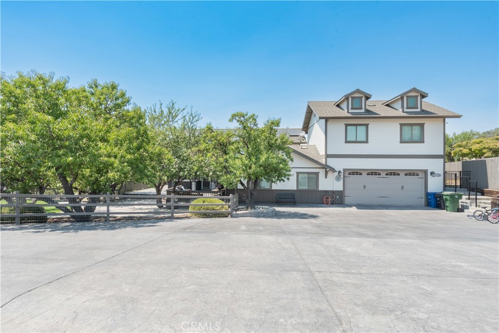 a view of house with outdoor space and street view