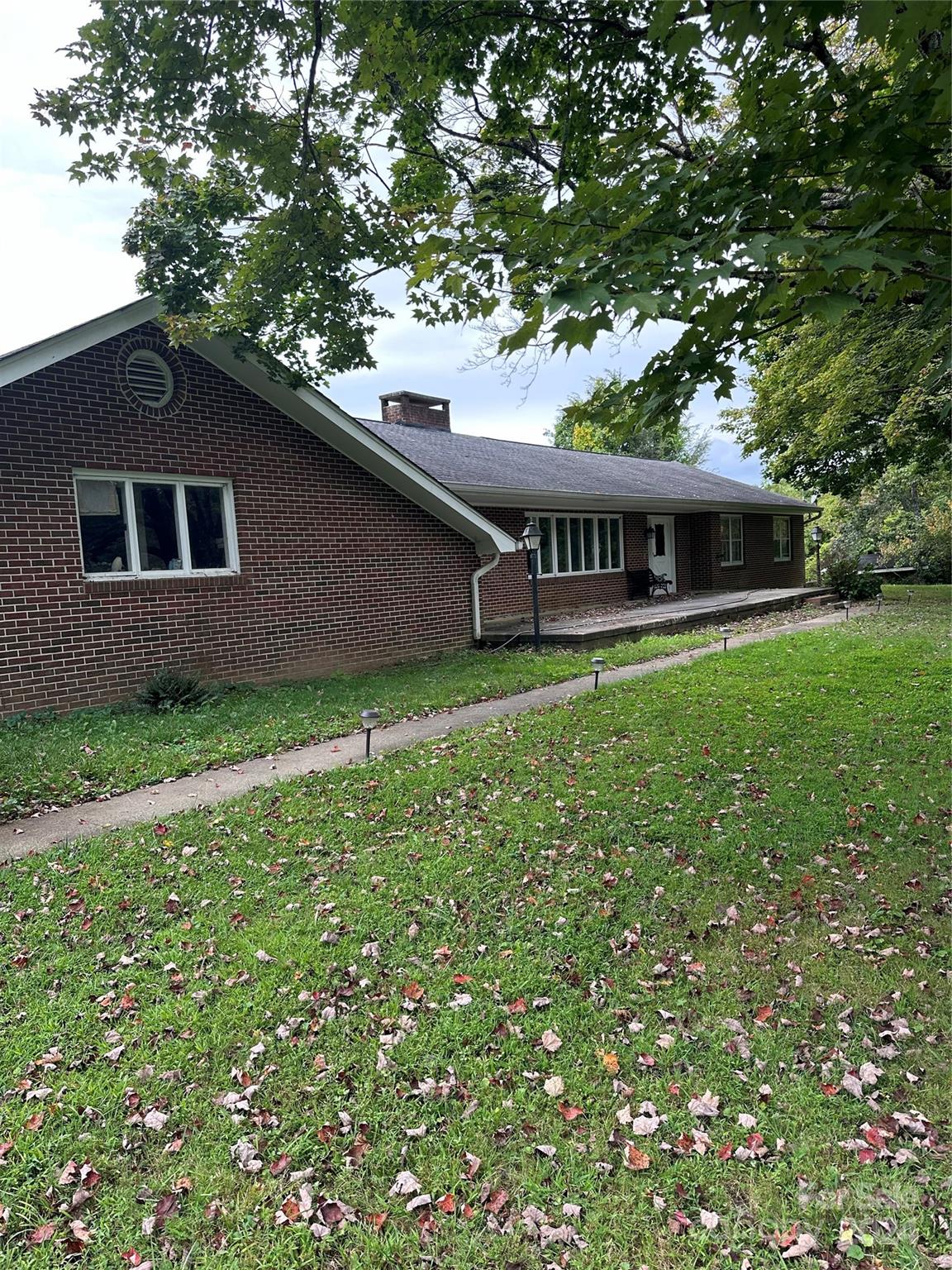 a house view with a garden space