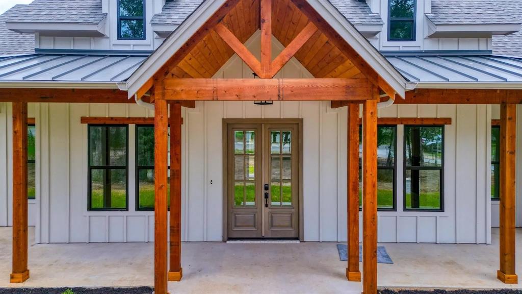 a front view of a house with a porch