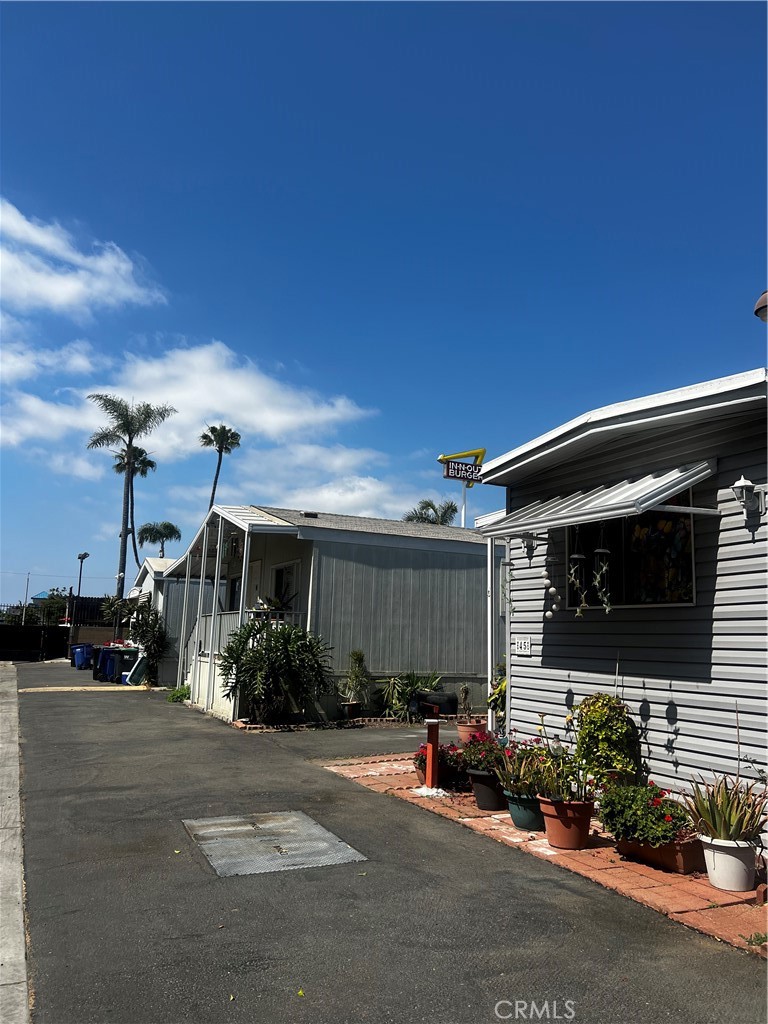 a view of a house with a street