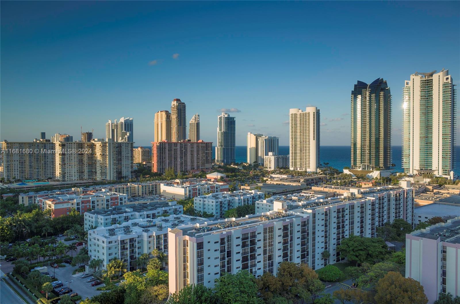 a view of a city with tall buildings