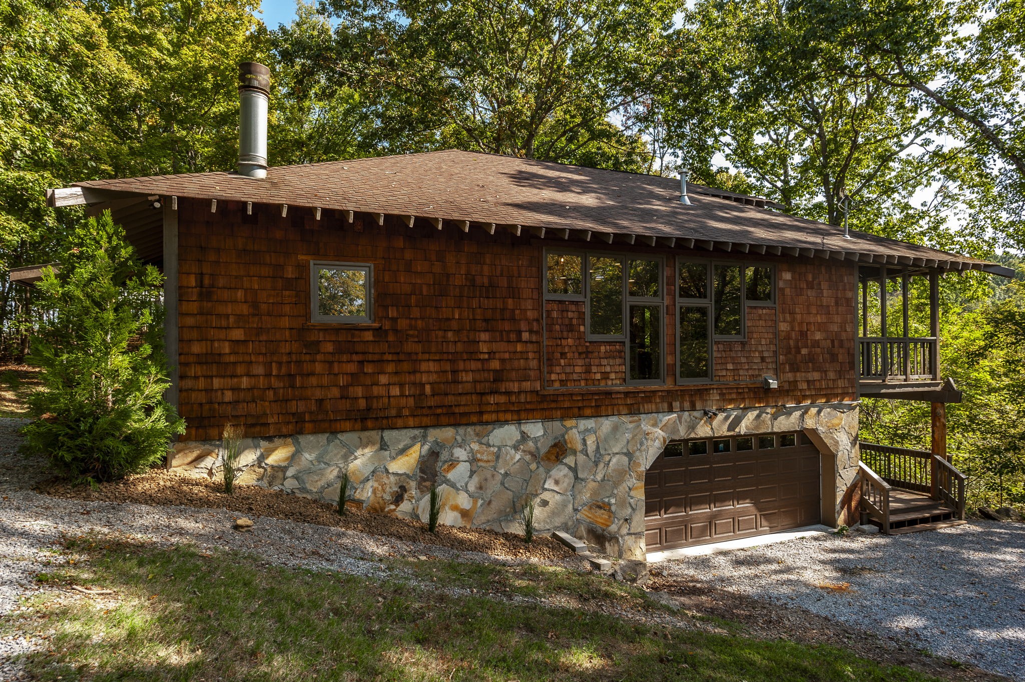 a backyard of a house with barbeque oven