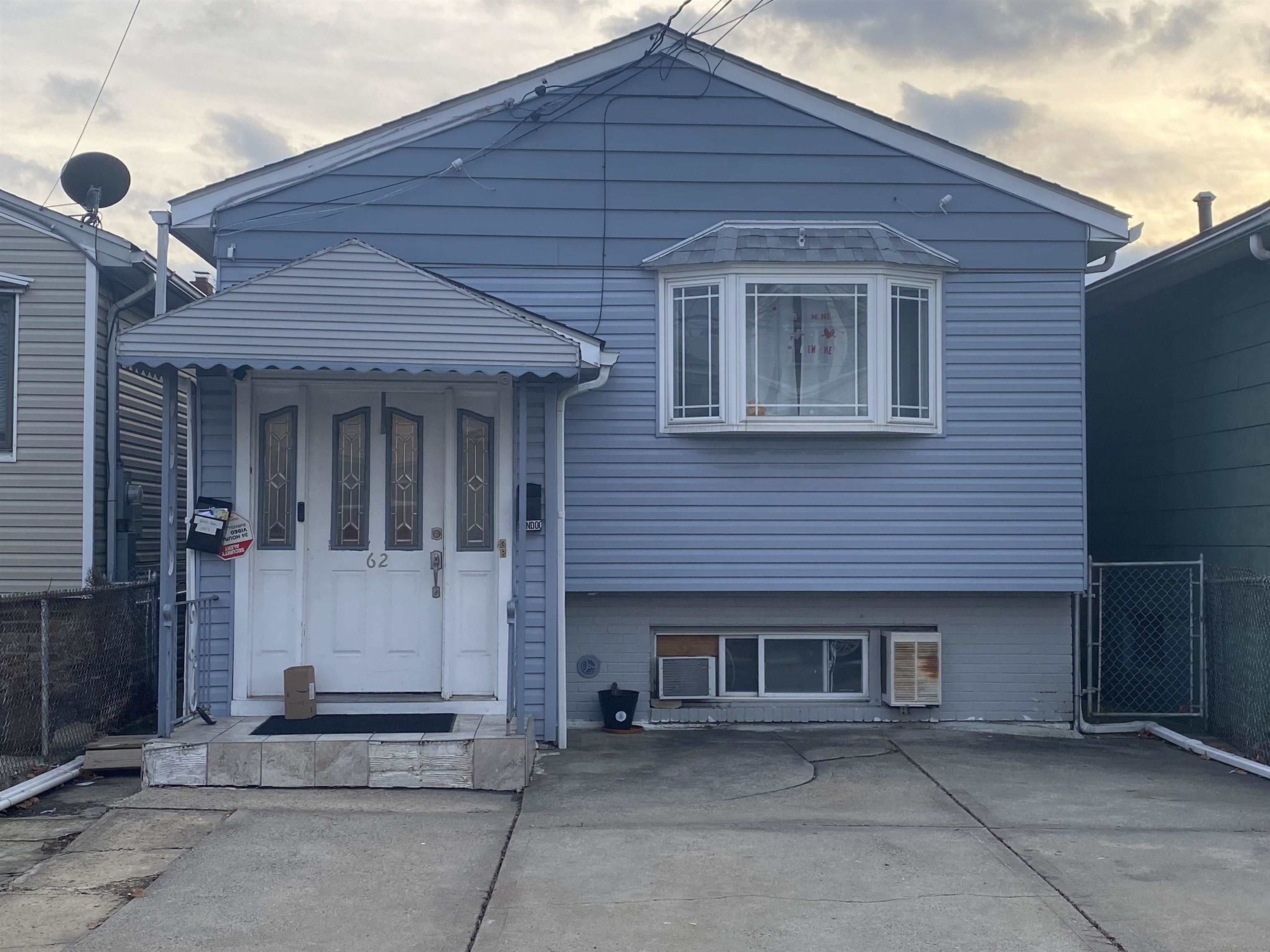 a front view of a house with a garage