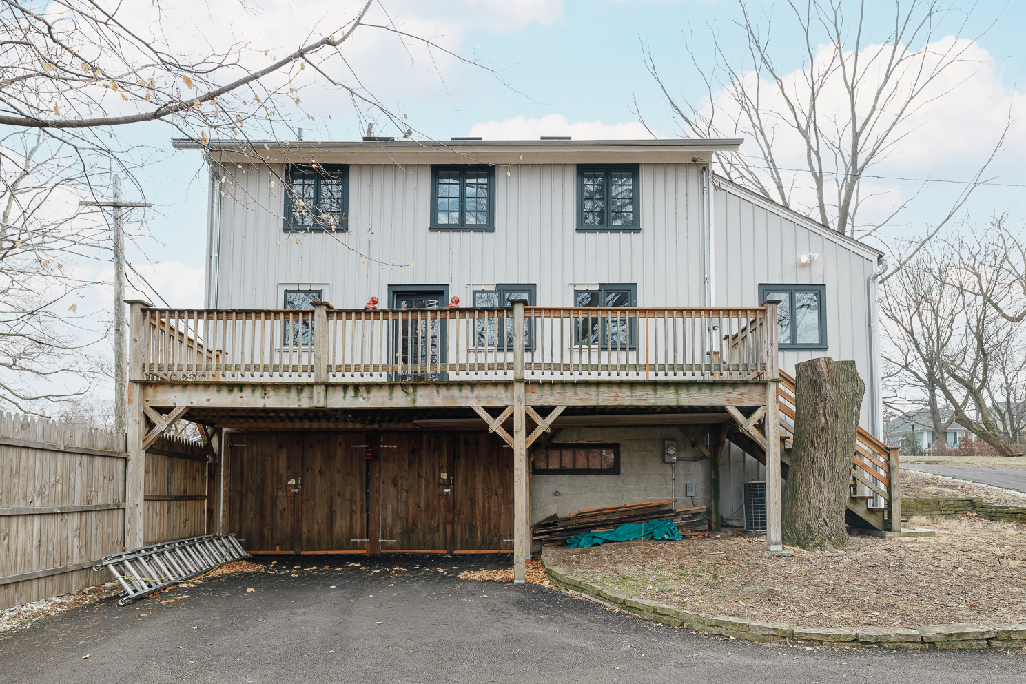 a front view of a house with garage