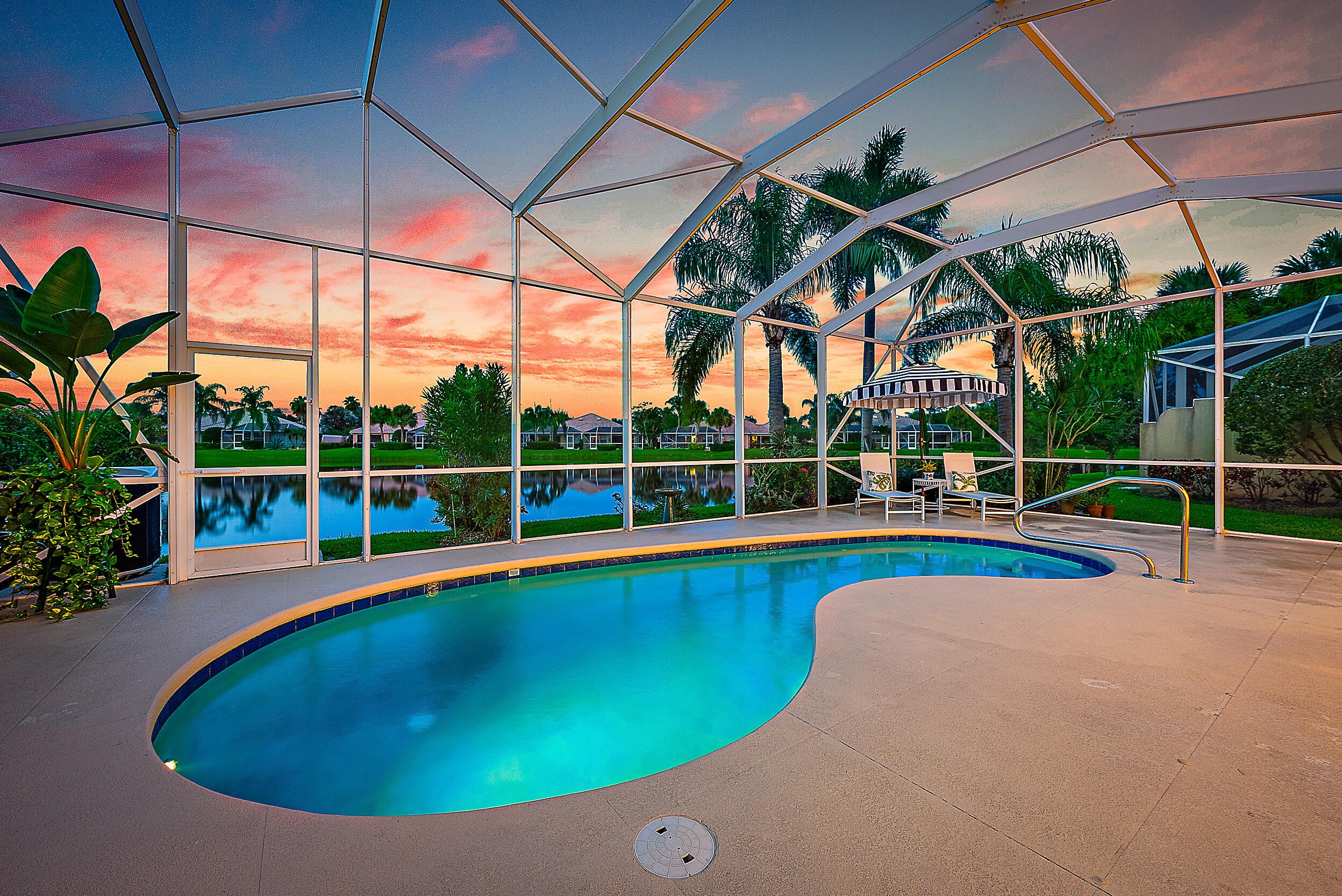 a view of a backyard with swimming pool