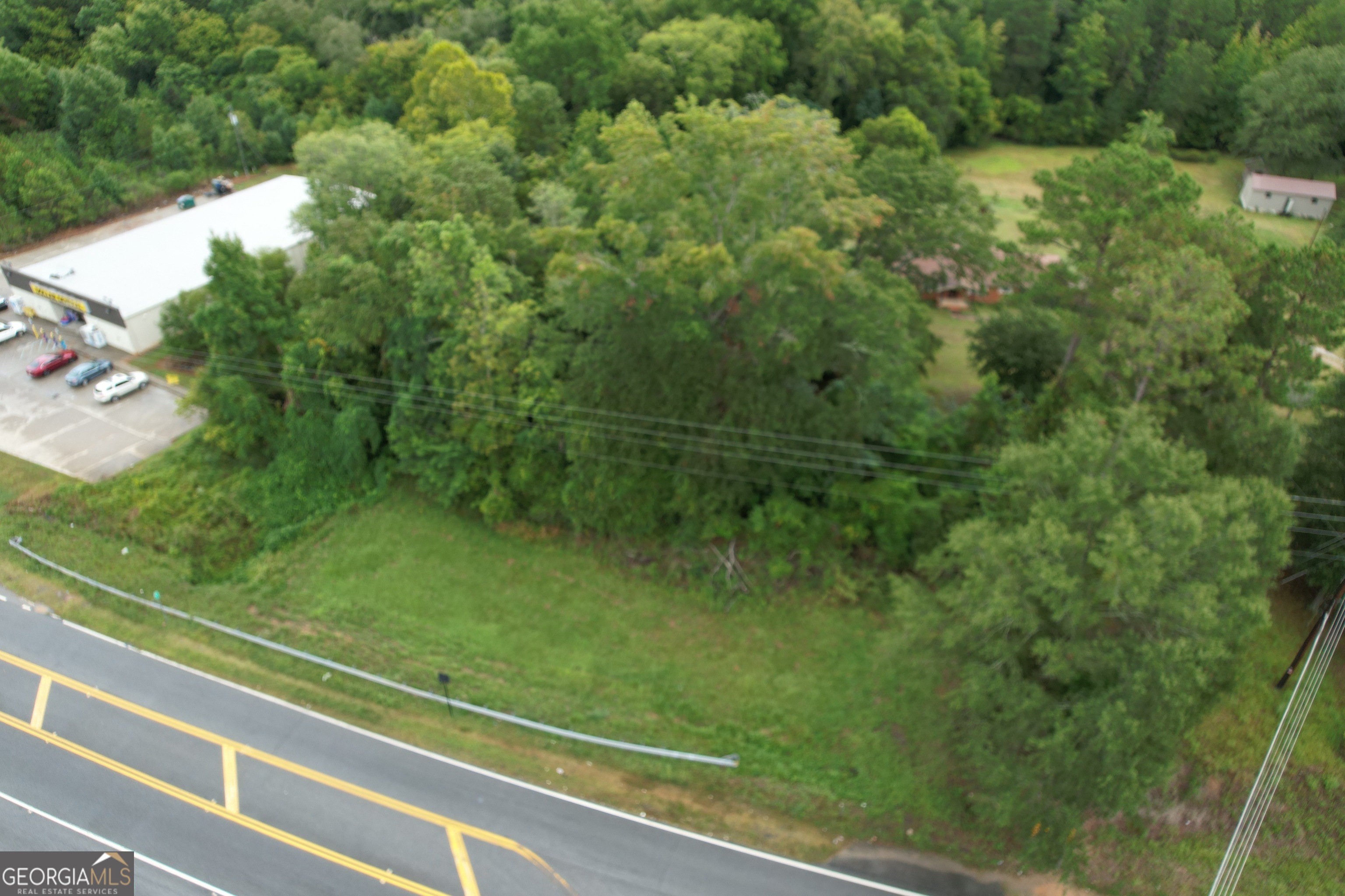 a view of a yard from a balcony