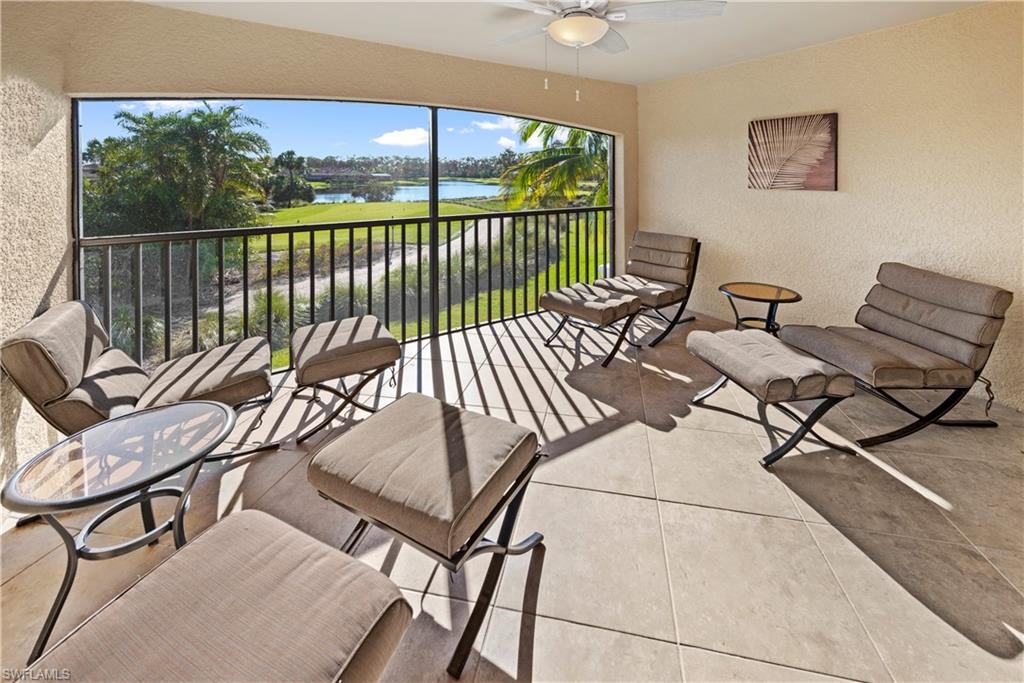 a view of a chairs and table in patio