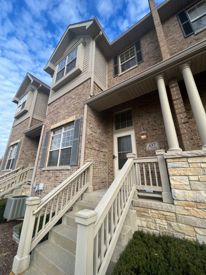 a front view of a house with windows