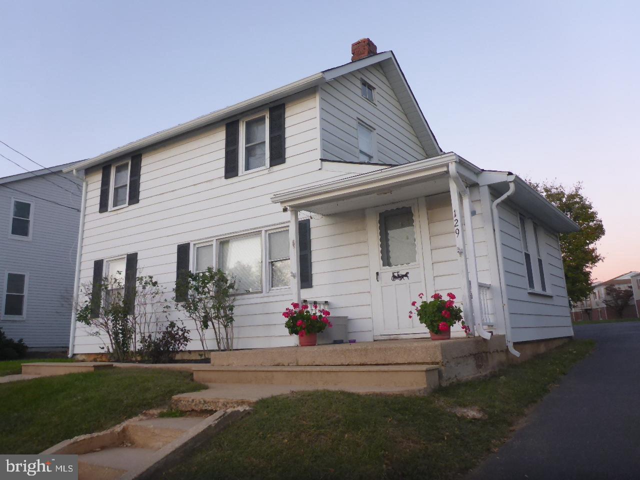 a front view of house with yard