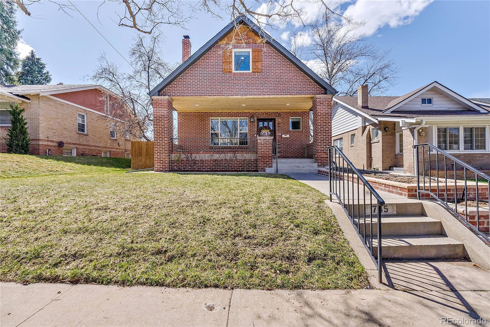 a front view of a house with yard