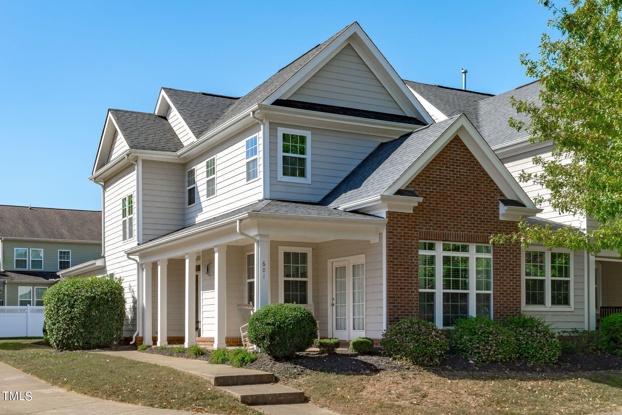 front view of a house and a yard