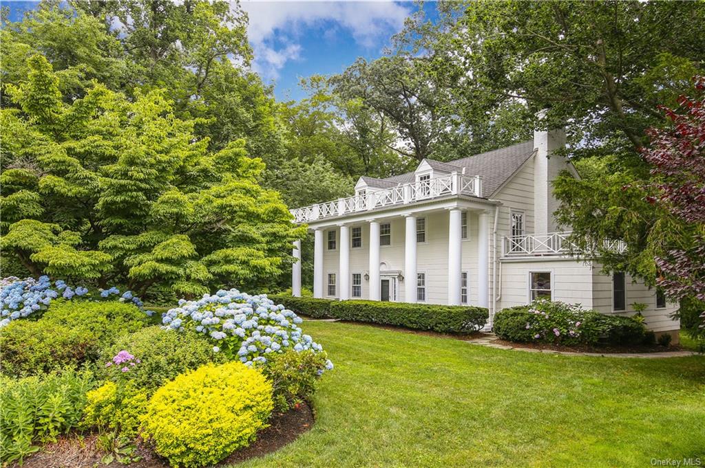 Elegant Colonial on a tranquil street in the Edgewood neighborhood of Scarsdale.  A short walk to Edgewood Elementary and close to downtown Scarsdale shops and Metro North train.