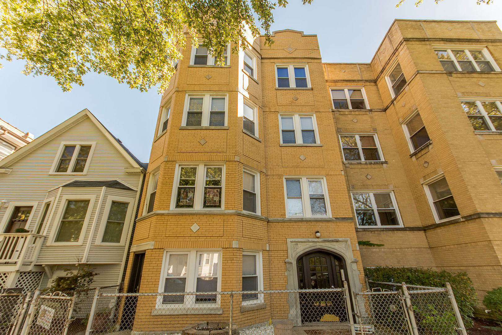 a front view of a multi story residential apartment building