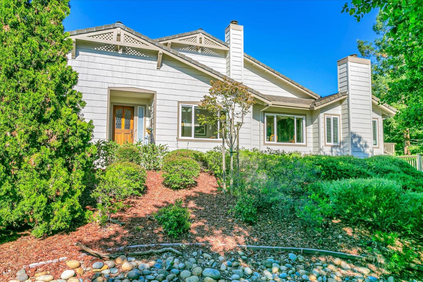 front view of a house with a yard