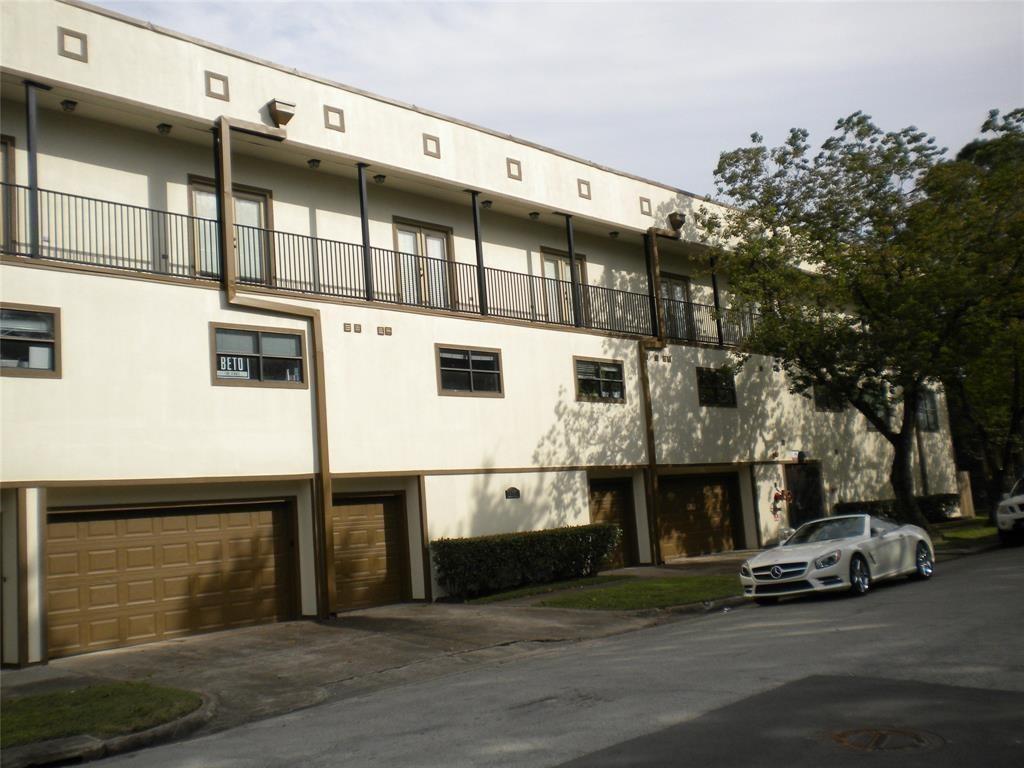 a car parked in front of a building