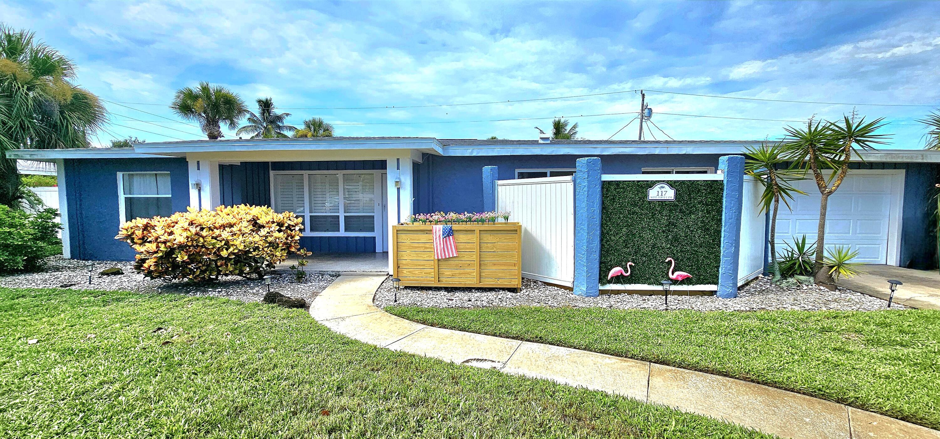 a front view of a house with porch