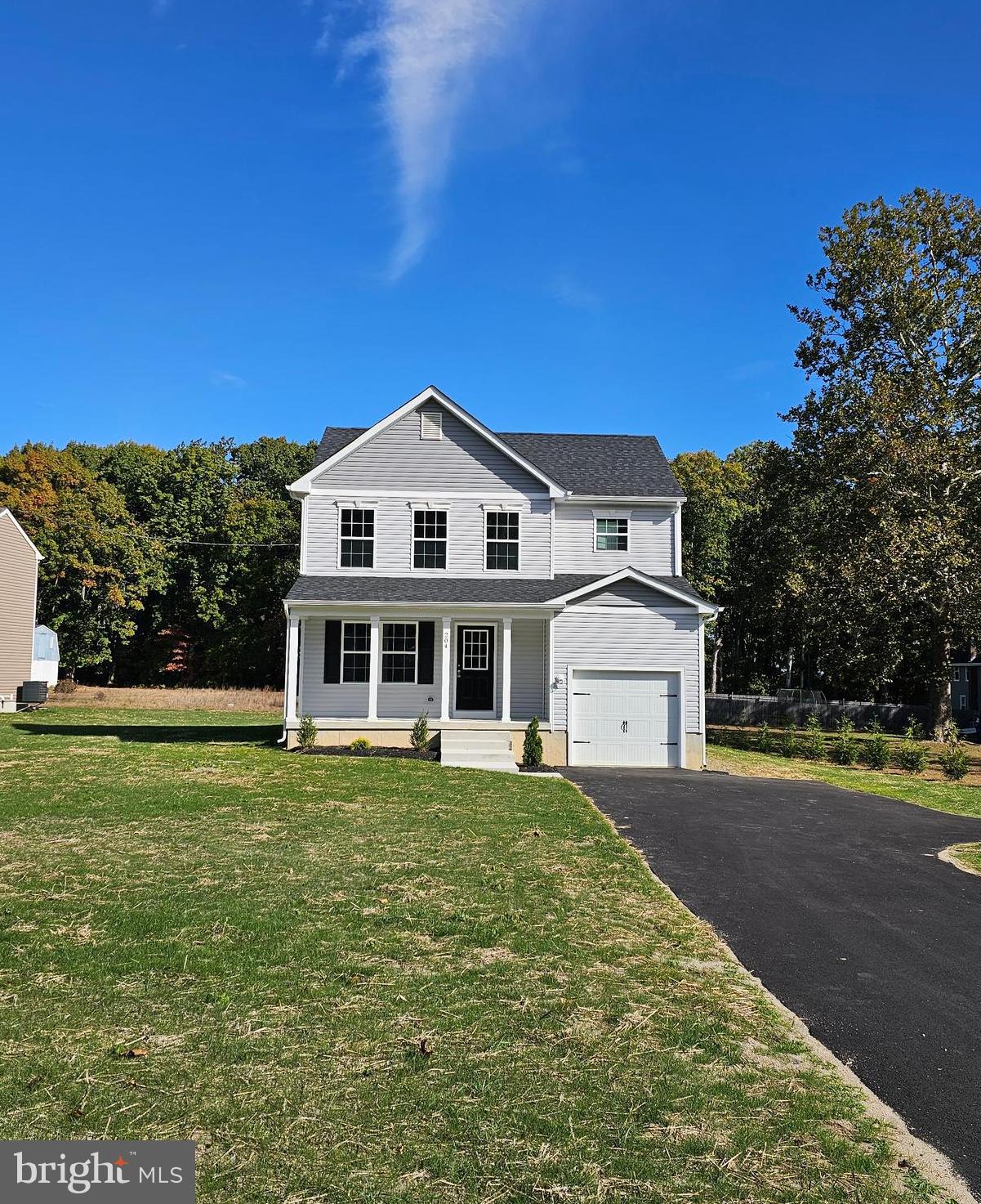 a view of a house with a big yard