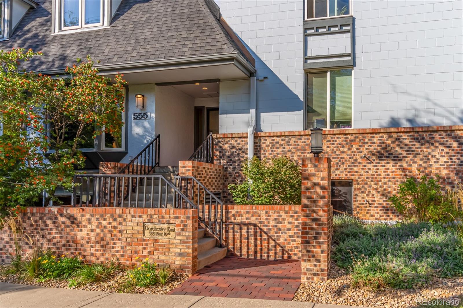 a view of house with wooden fence