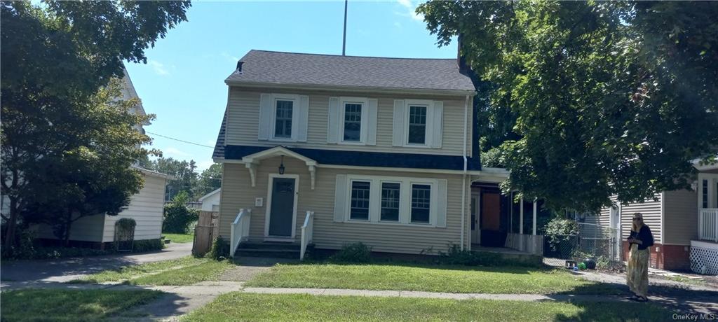 View of front of home with a front lawn