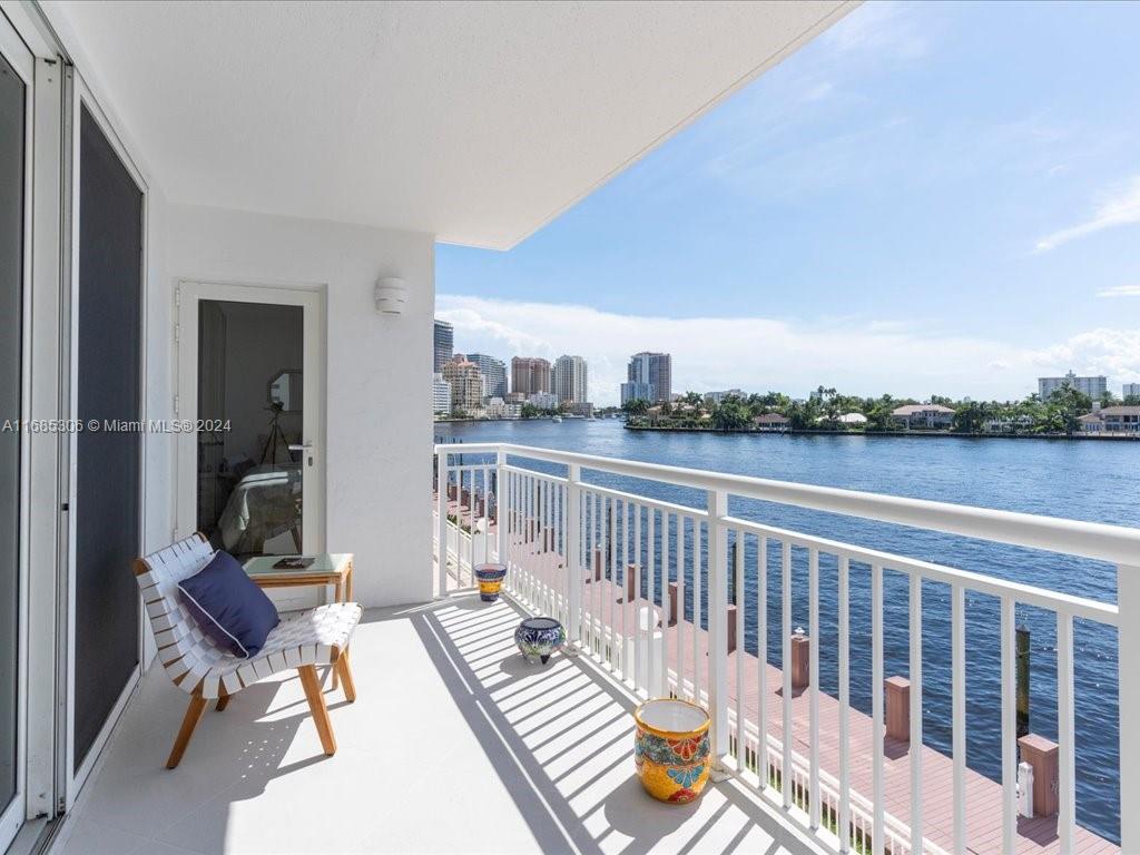 a view of balcony with furniture