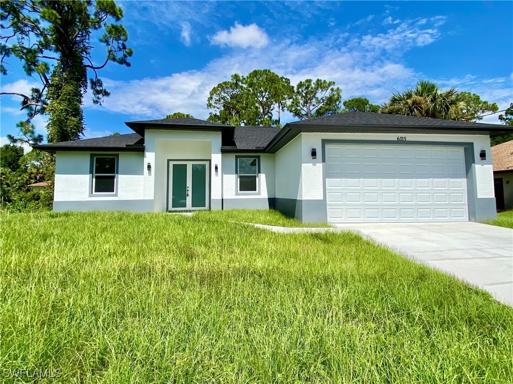 front view of house with a yard