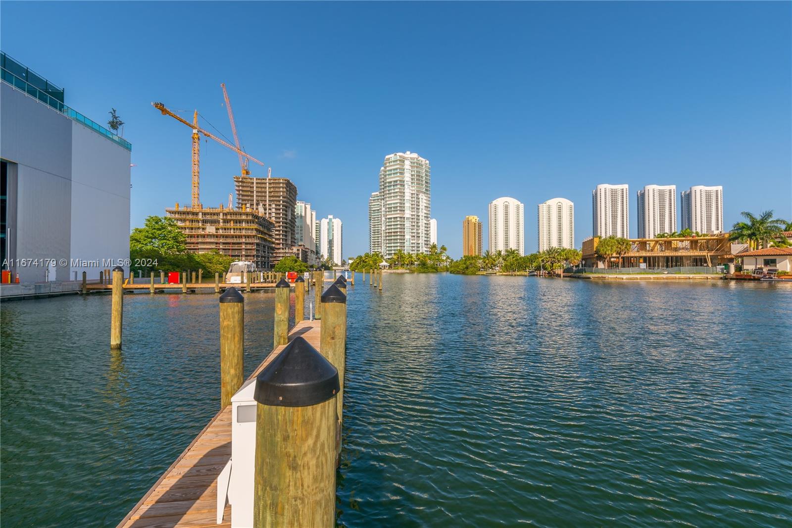 a view of a lake with building in front of it