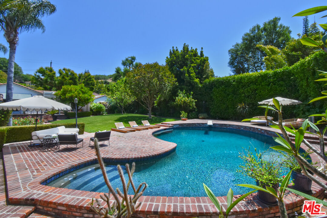 a view of an outdoor space patio and swimming pool