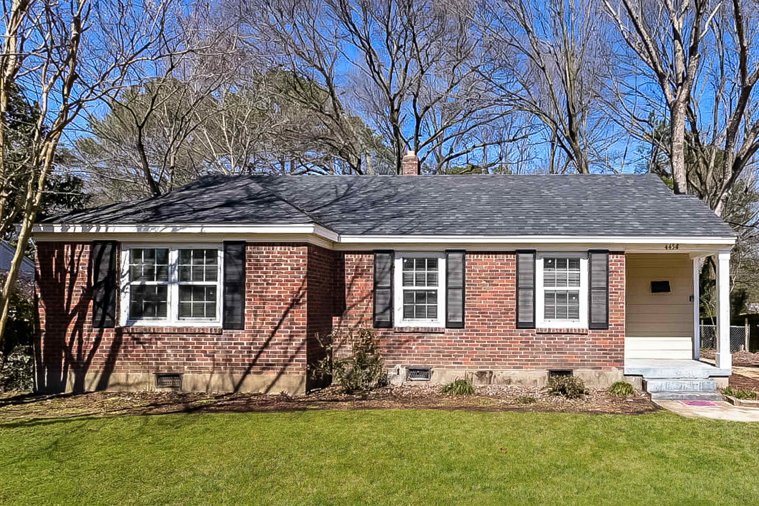 front view of a house with a yard