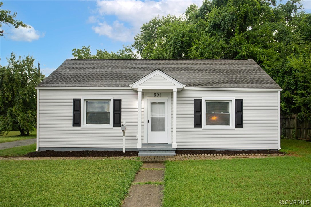 View of front of home with a front lawn