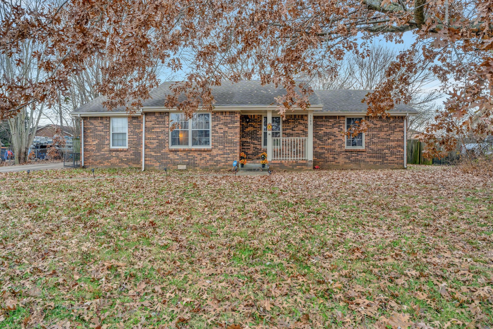 front view of a house with a yard