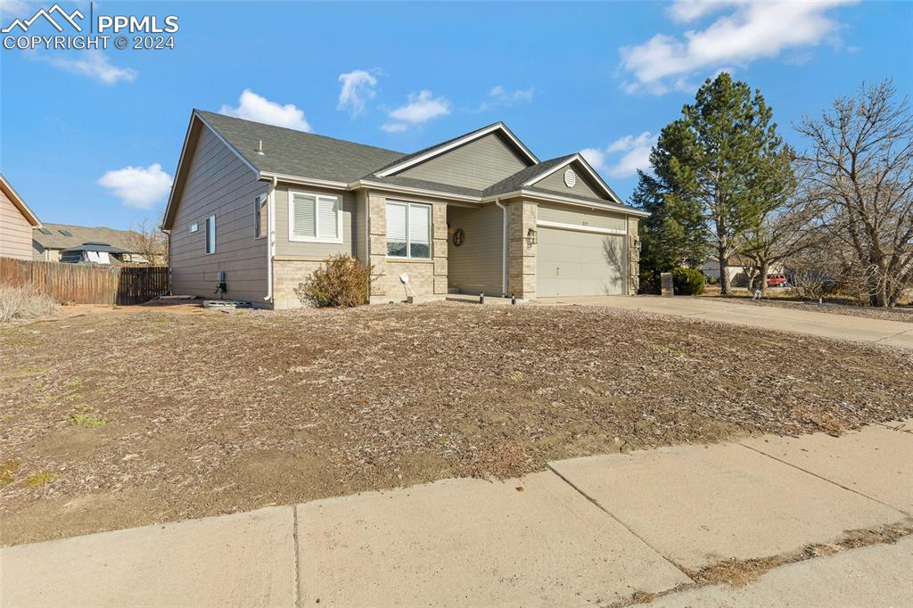 View of front of house with a garage