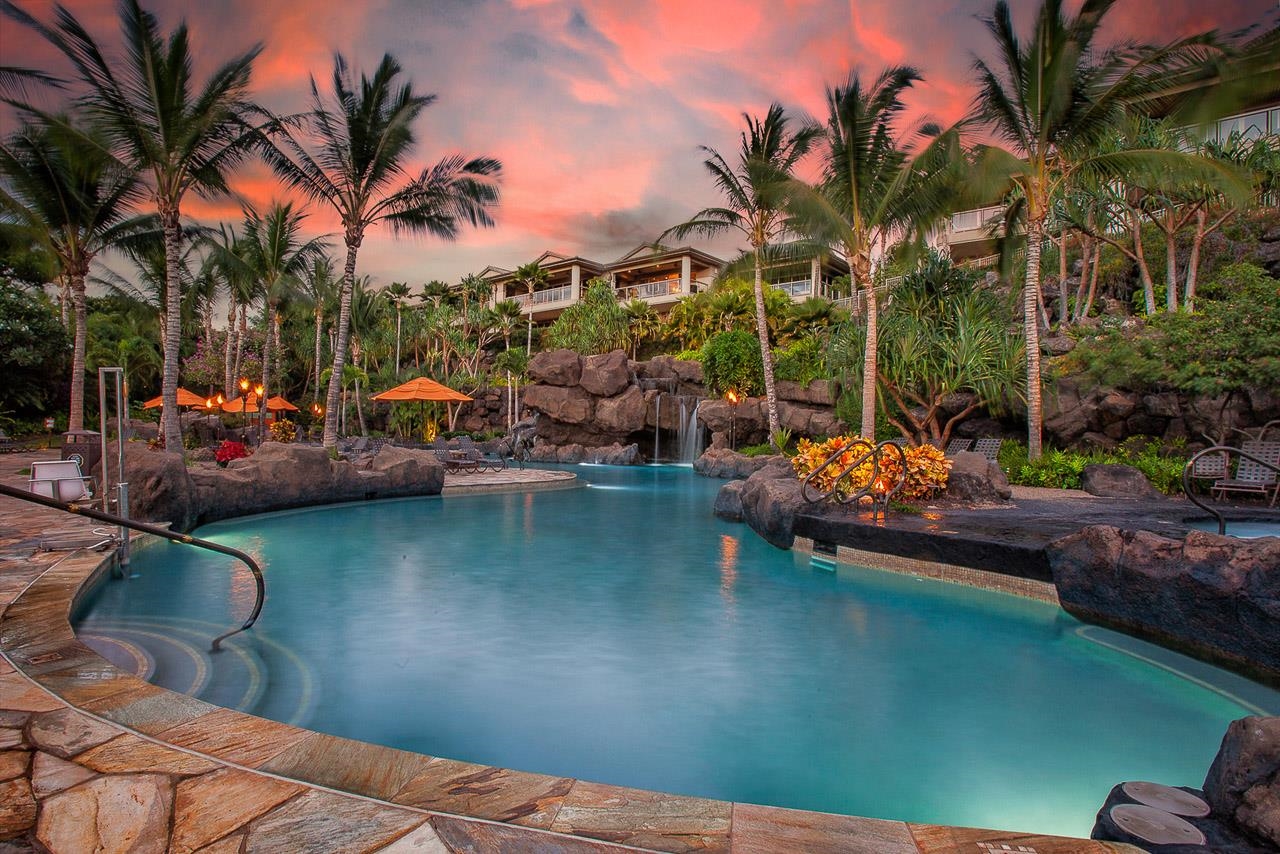 a view of swimming pool with outdoor seating