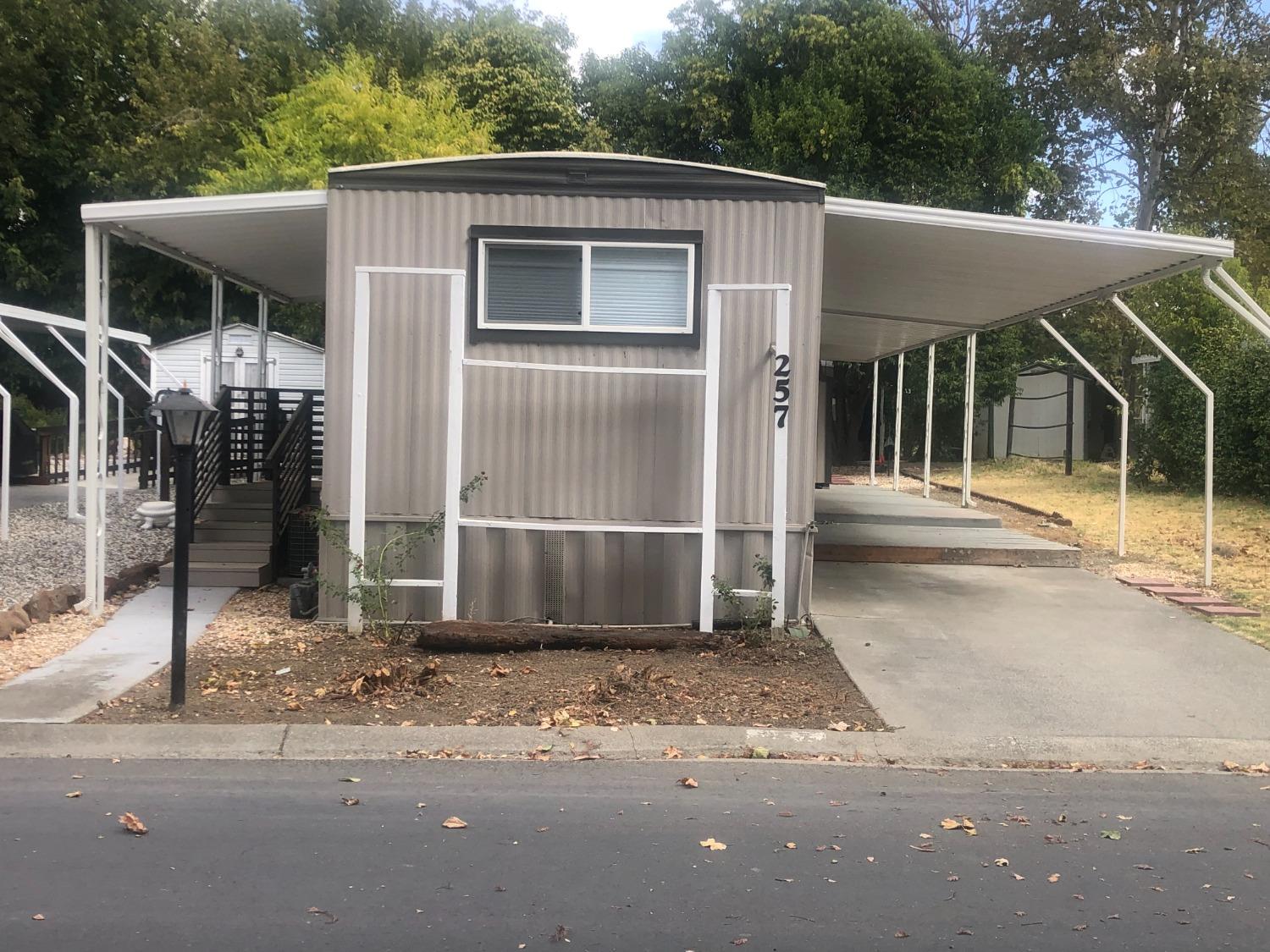 a front view of a house with porch