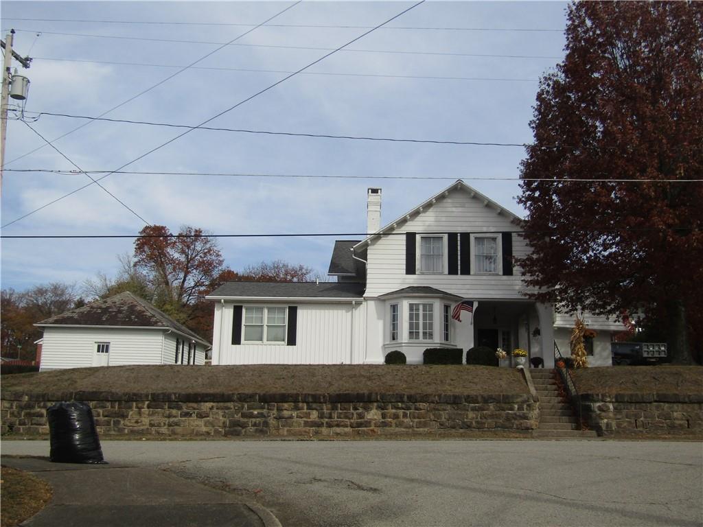 a front view of a house with a porch