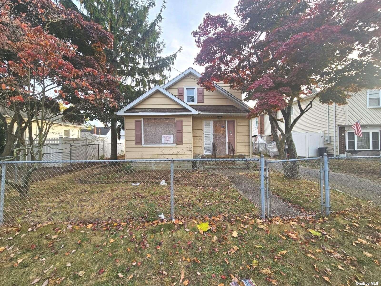 a house with trees in the background