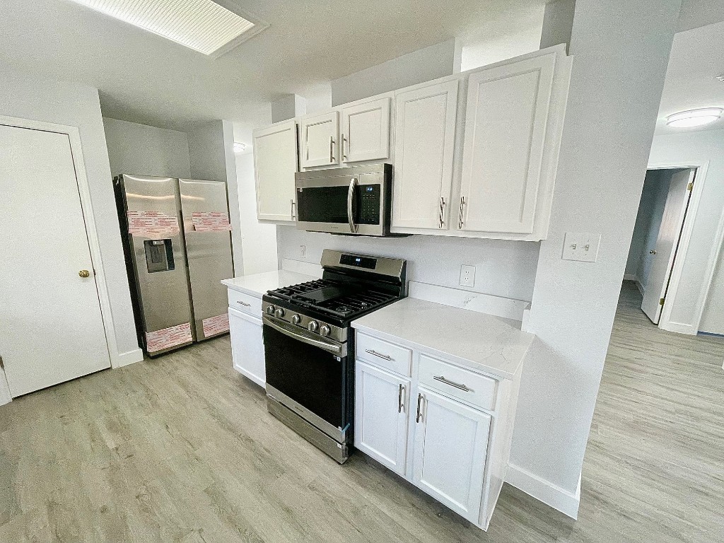 Remodeled Kitchen with new SS Appliances, new gas range