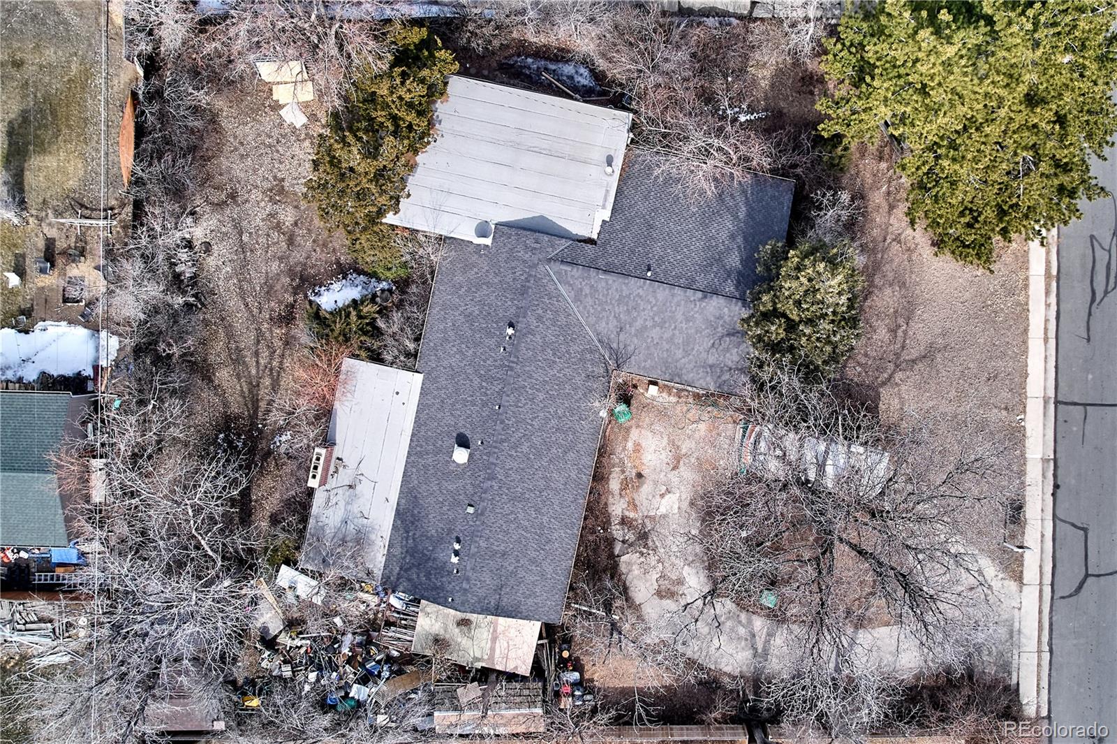 an aerial view of house with yard