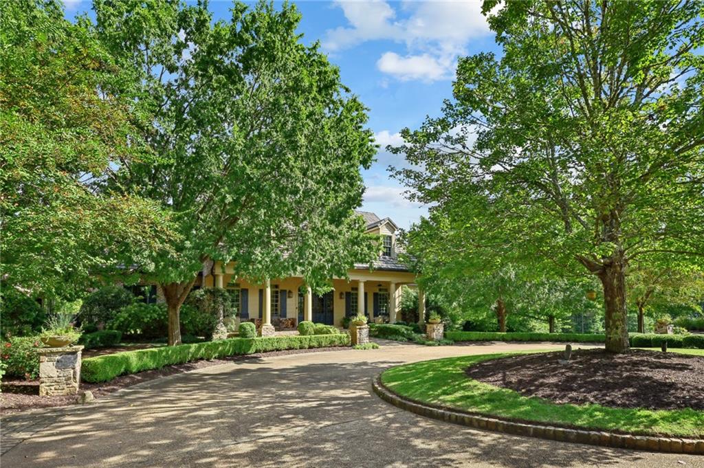 a view of a house with a garden