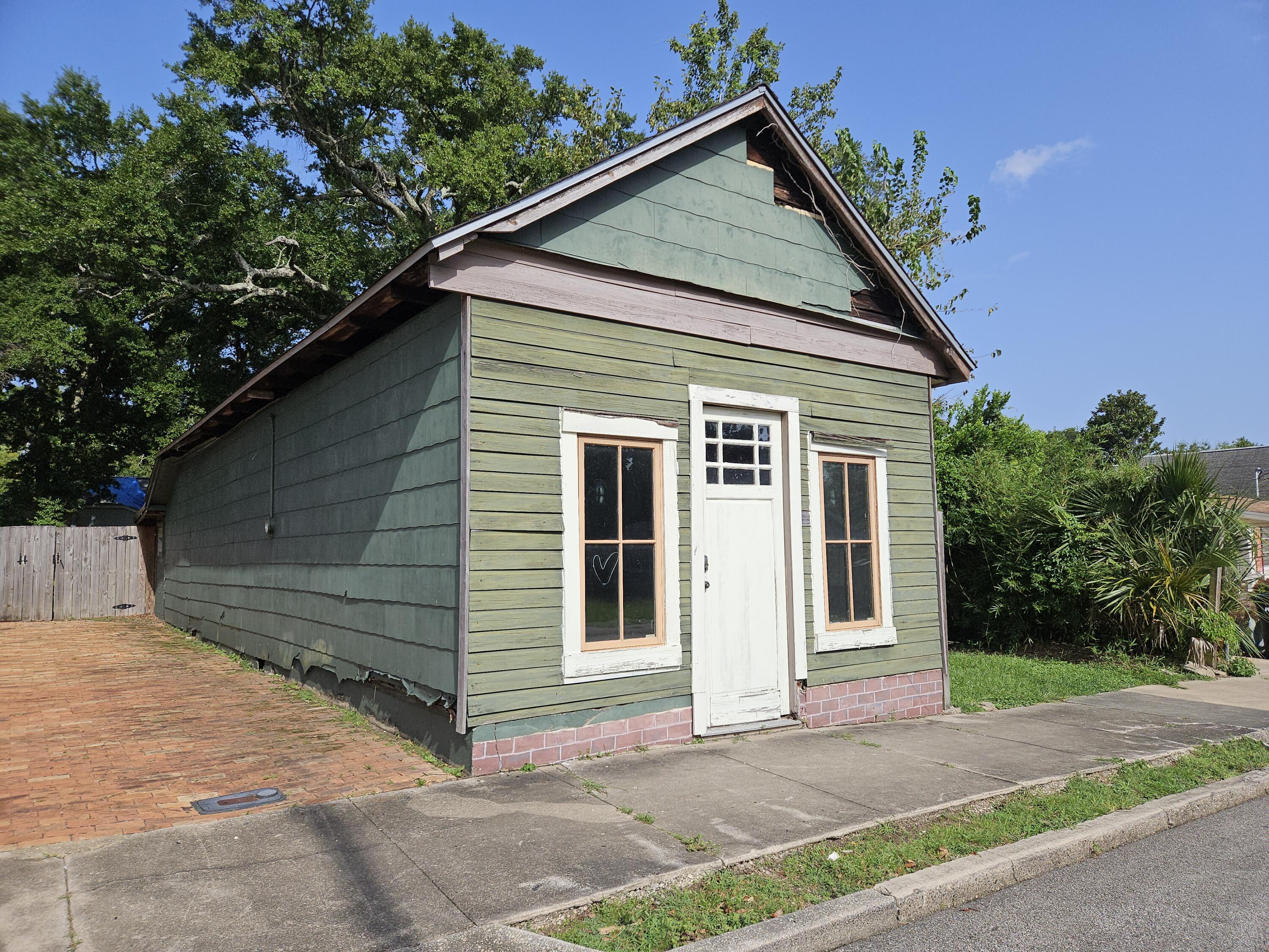 a front view of a house with a garage