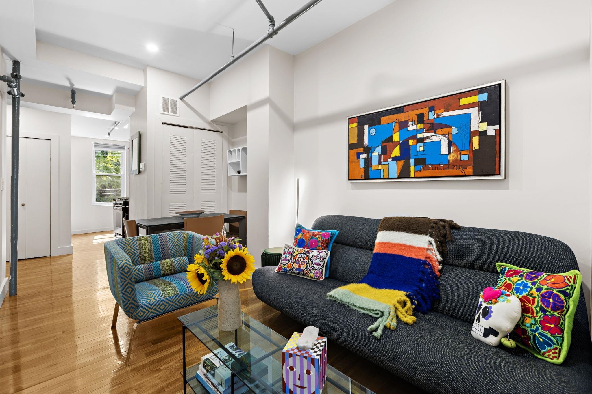 a living room with furniture and a couch