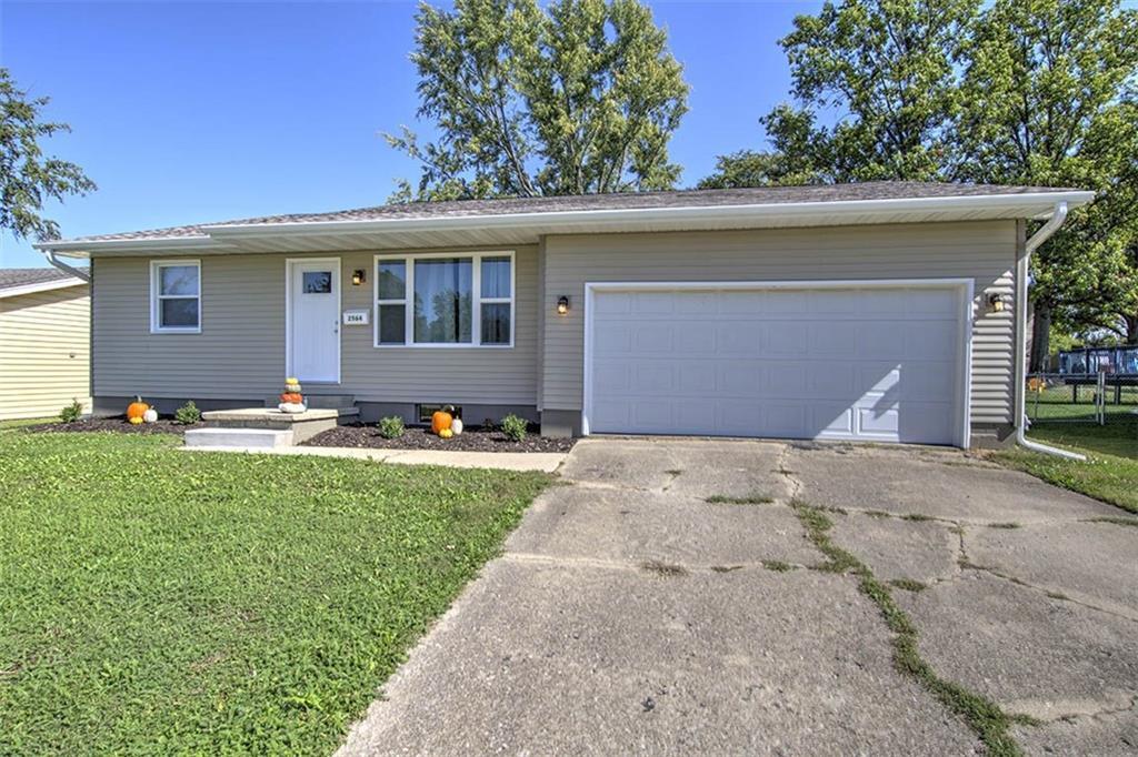 a front view of house with yard