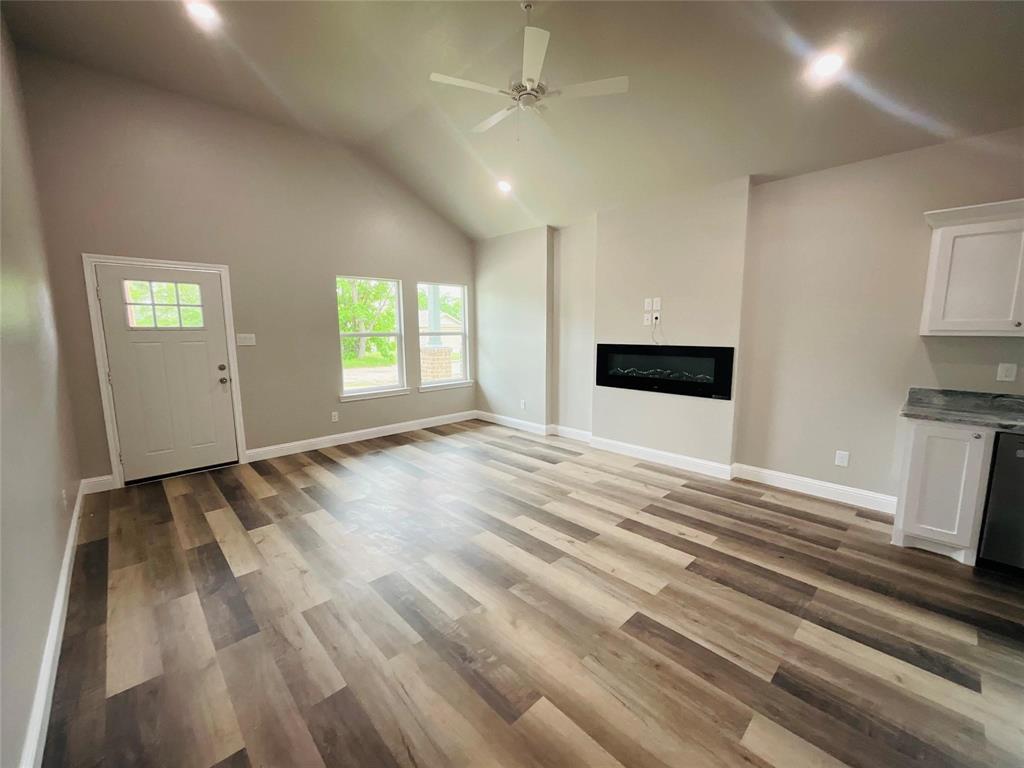 a view of empty room with windows