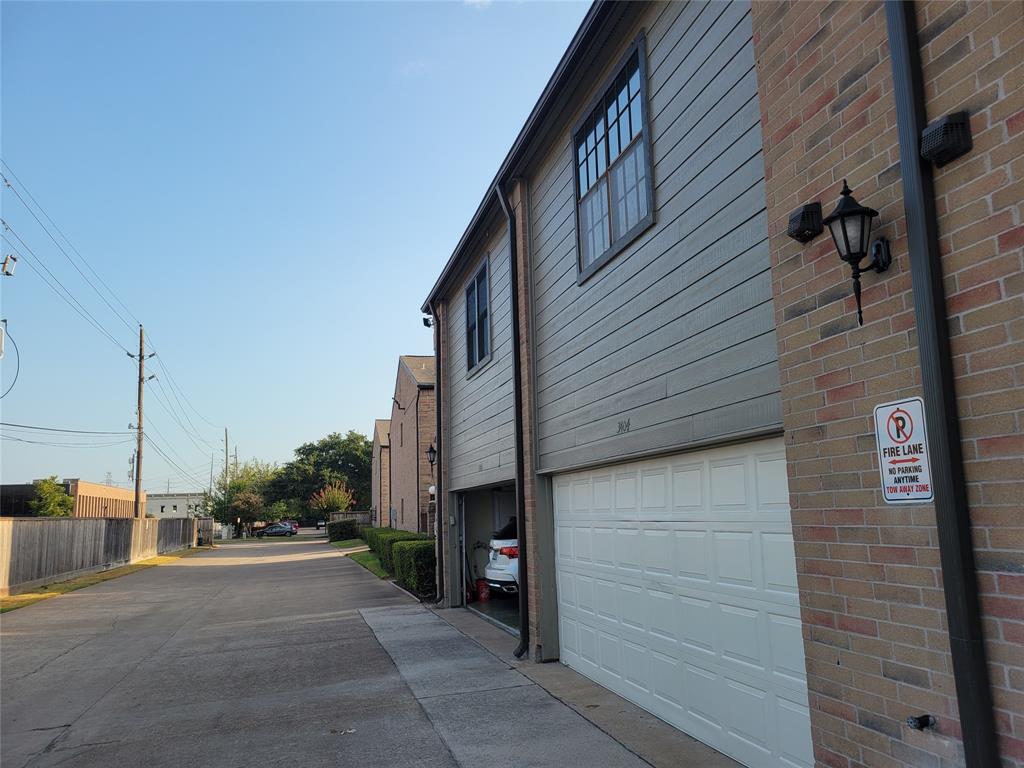 a view of a street from a brick building