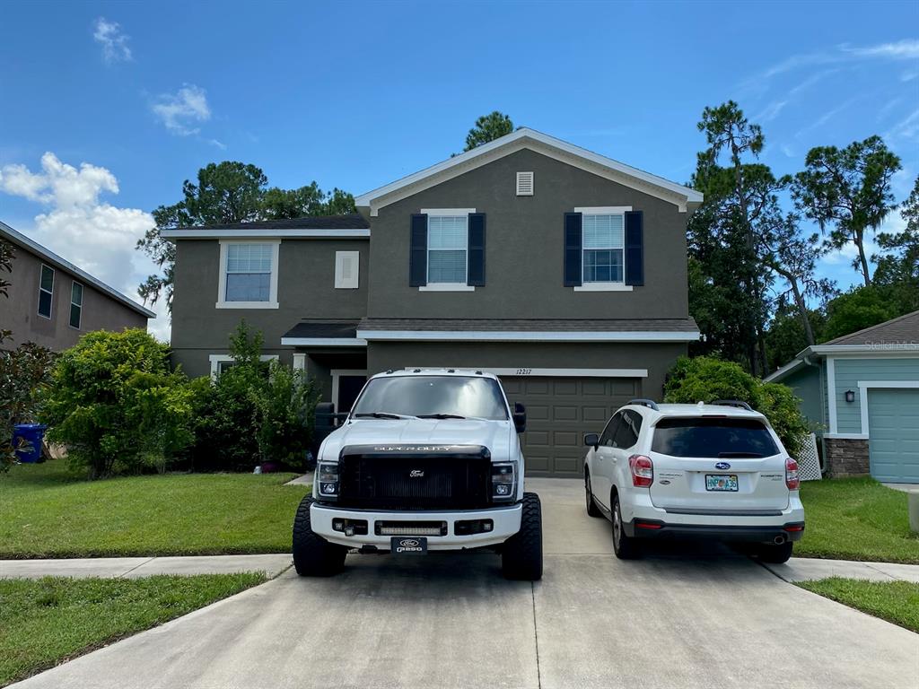 a car parked in front of a house